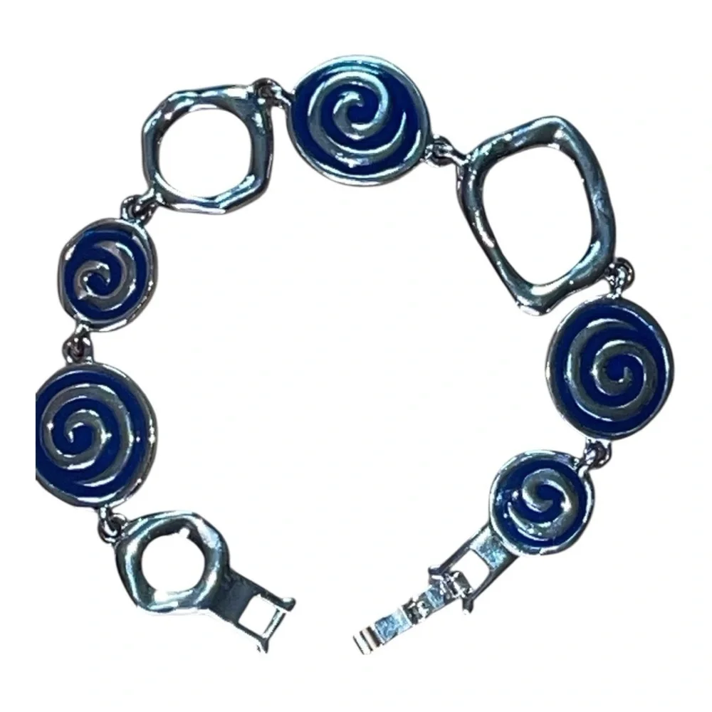 Lia Sophia bracelet, silver tone with blue enamel discs, no signs of wear